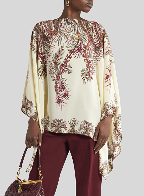 Asymmetrische poncho top zijde roomwit